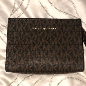 Brand new Michael Kors cosmetic bag